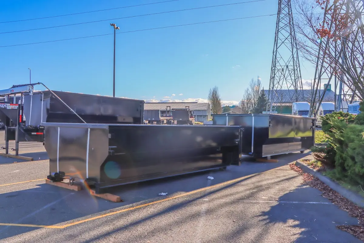Roll-off dumpster ready for waste disposal at job site for Construction Dumpster Rental in Deer Park